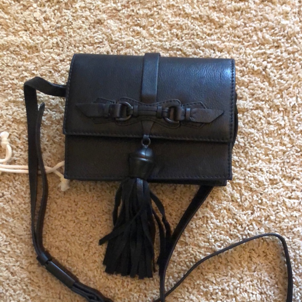 Black leather bag with long adjustable strap
